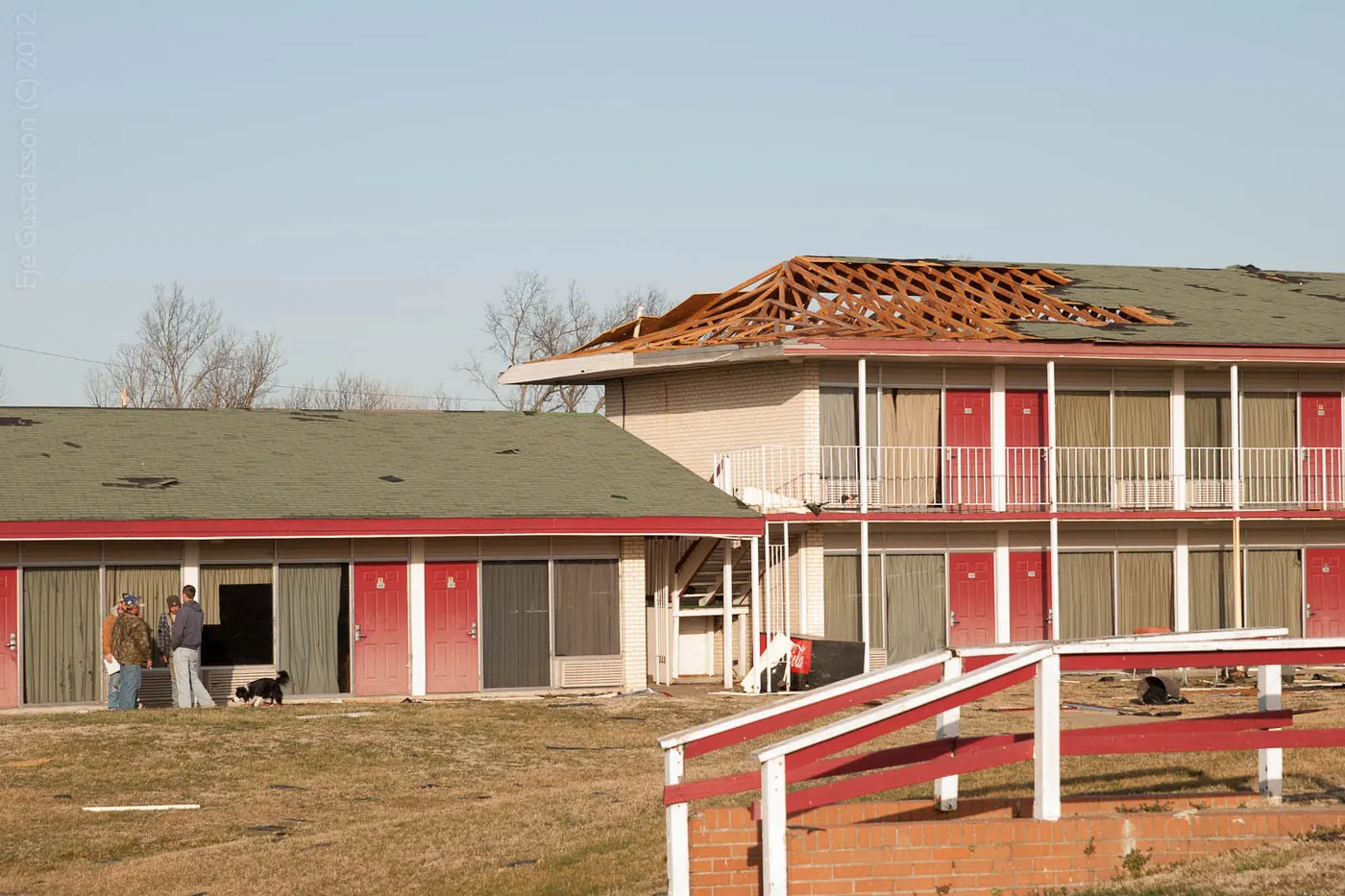Two-story motel with its roof torn open by storm winds in Pittsburg, Kansas