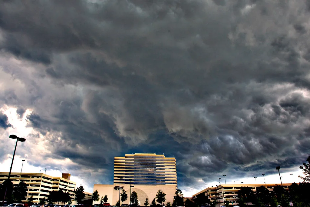 Dark storm clouds over the Riverchase Galleria mall and hotel tower in Hoover, a suburb of Birmingham, Alabama