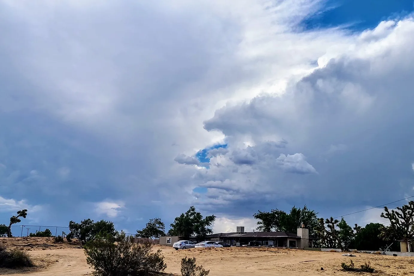 Storm clouds forming fast over the high desert on a hot, humid afternoon in Hesperia, California