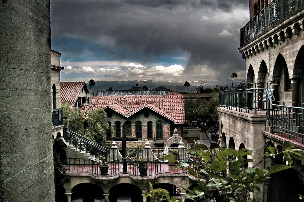 Storm clouds gathering over the domes and arches of the Mission Inn in Riverside, California