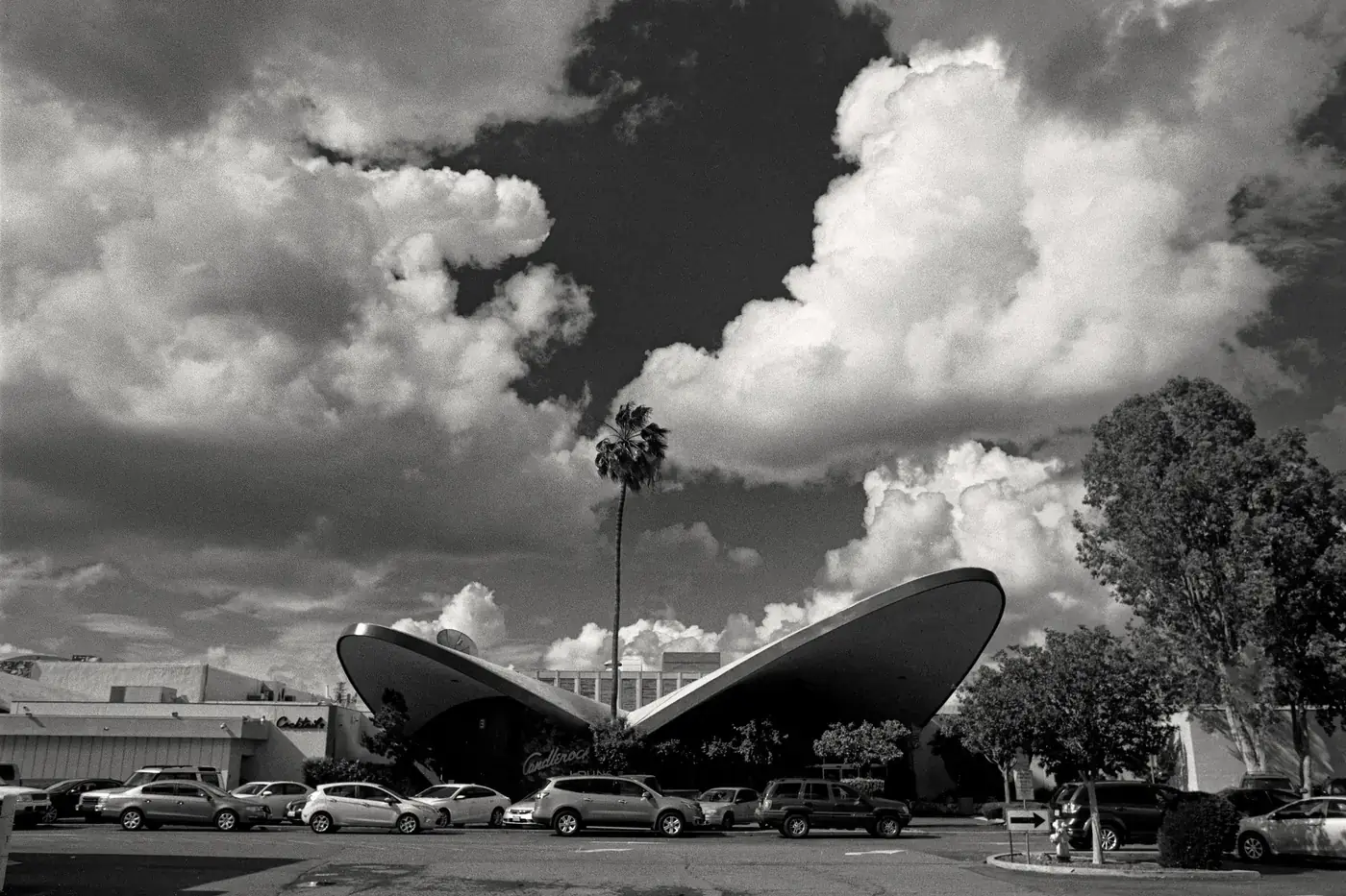 Clouds over the Country Club Lanes bowling alley in Sacramento, California, in black and white