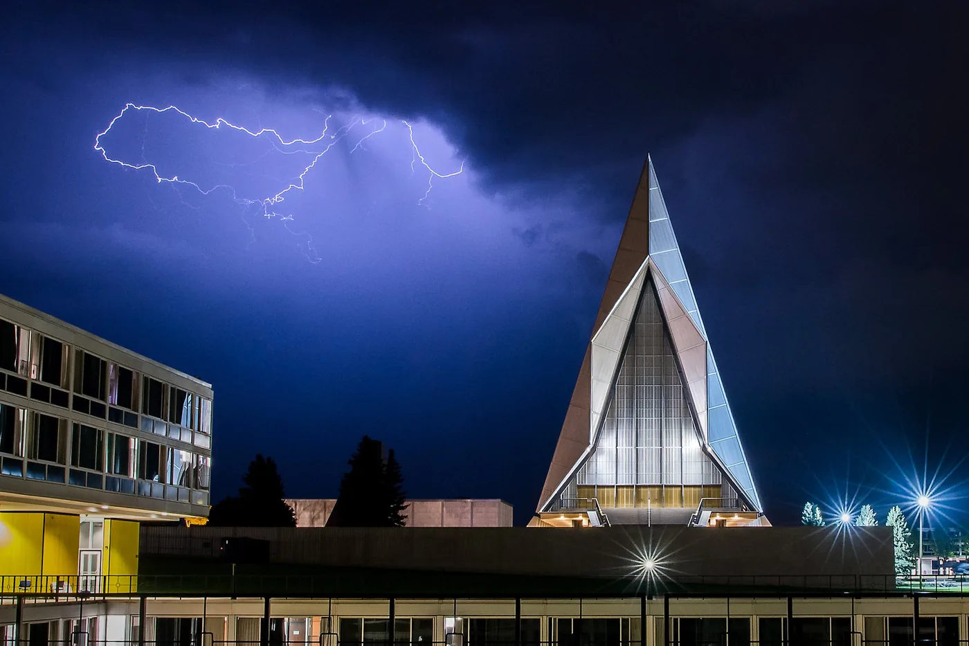 Lightning from a late-evening thunderstorm above the Cadet Chapel at the U.S. Air Force Academy in Colorado Springs
