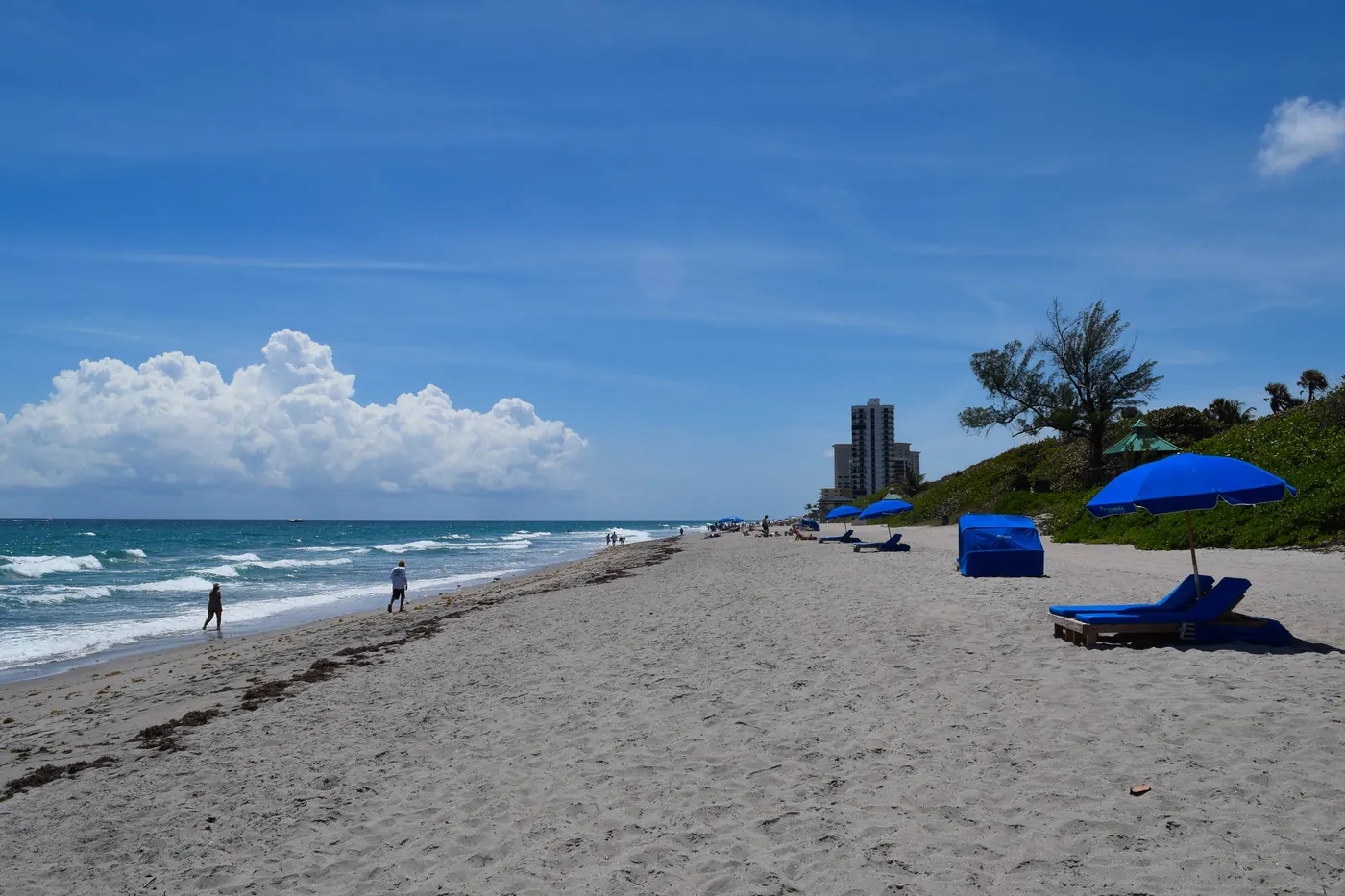 Small storm system building to the south over a quiet beach in Boca Raton, Florida