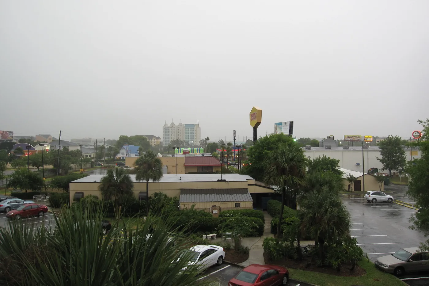 Misty air and wet parking lots over Orlando just after an hour-long thunderstorm