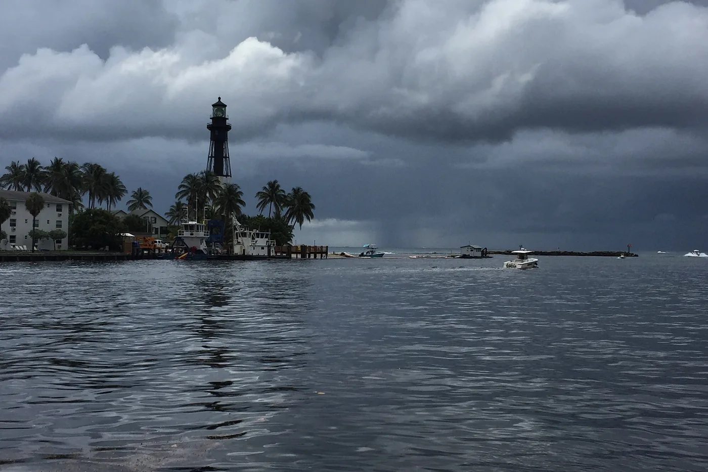 Storm approaching Pompano Beach, Florida, behind the Hillsboro Inlet Lighthouse