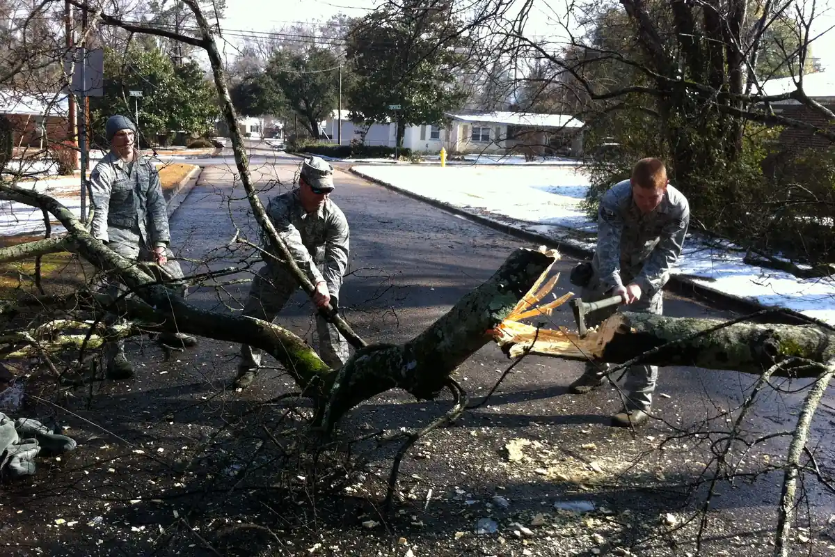 Georgia National Guard members clearing ice-storm debris from a road in Augusta in February 2014
