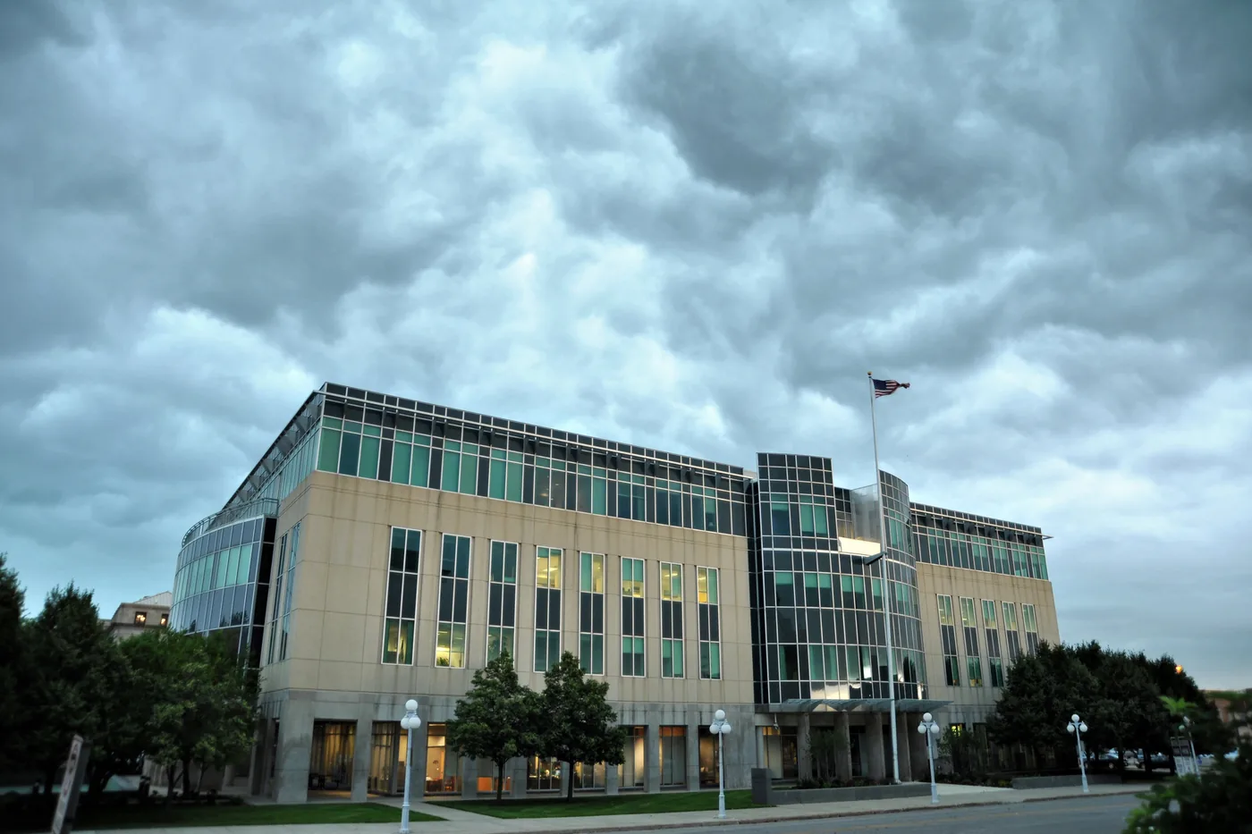 Fast-moving morning thunderstorm clouds rolling over an office building in downtown Des Moines, Iowa