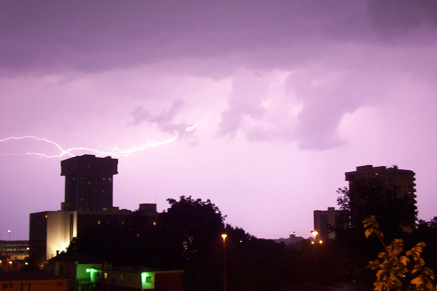 Lightning flashing behind Hammons Tower in Springfield, Missouri