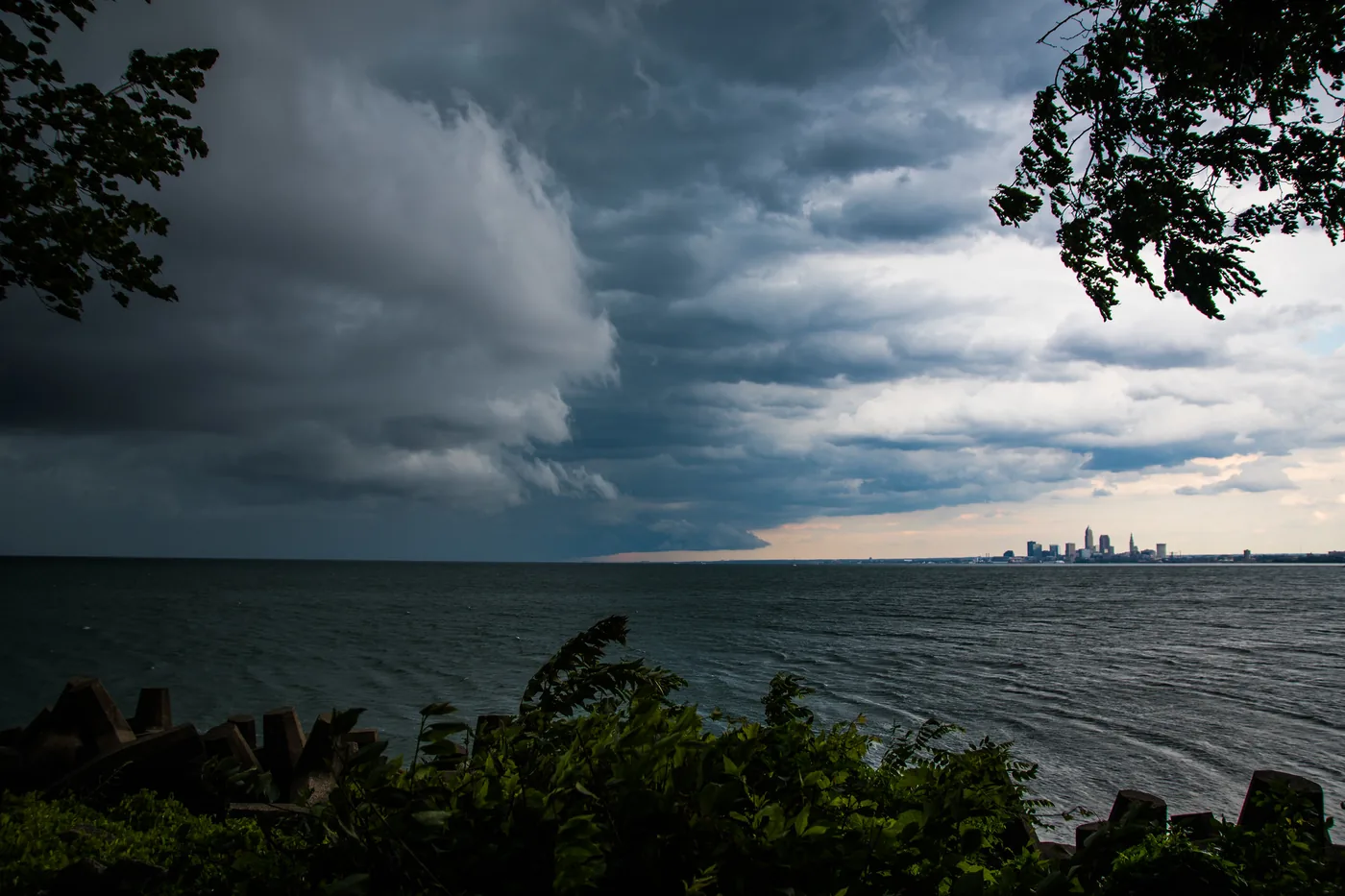 Storm clouds over Lake Erie with the Cleveland skyline on the horizon