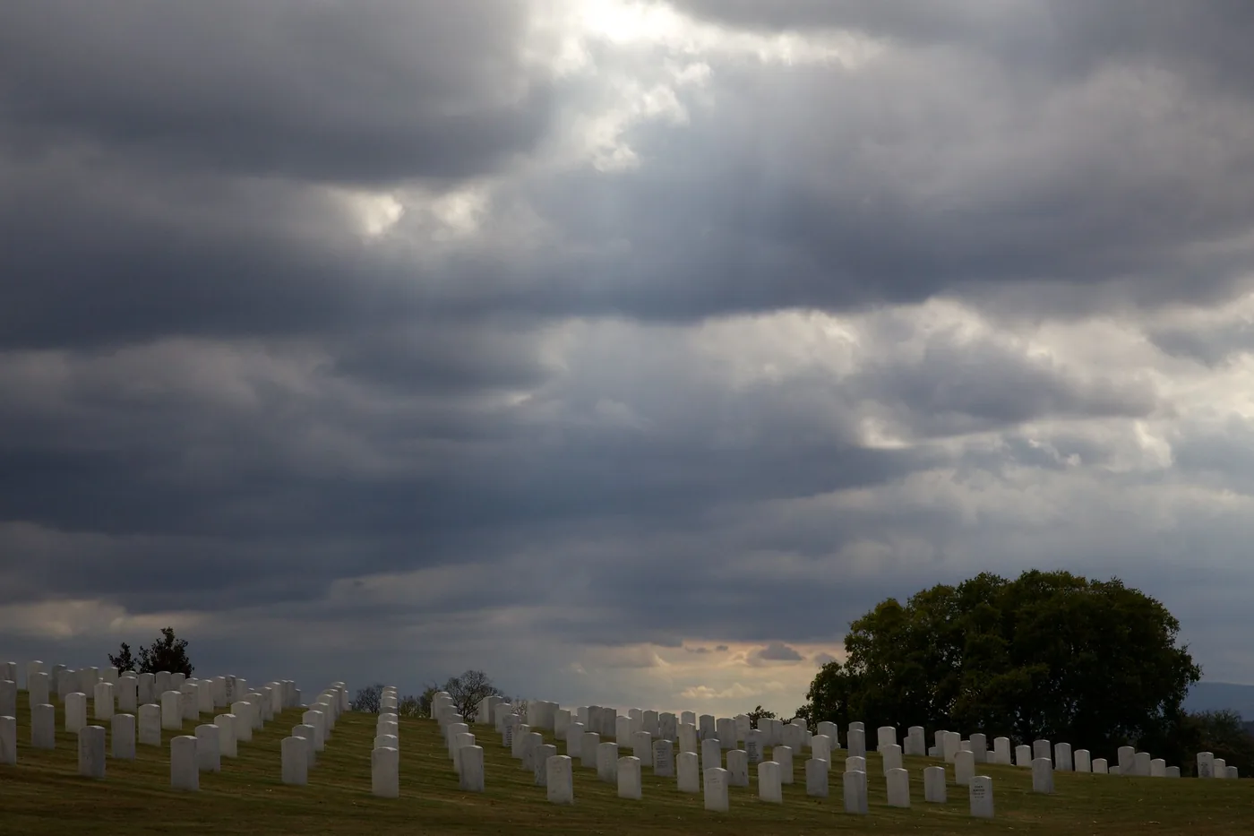 Storm clouds over the rows of headstones at Chattanooga National Cemetery