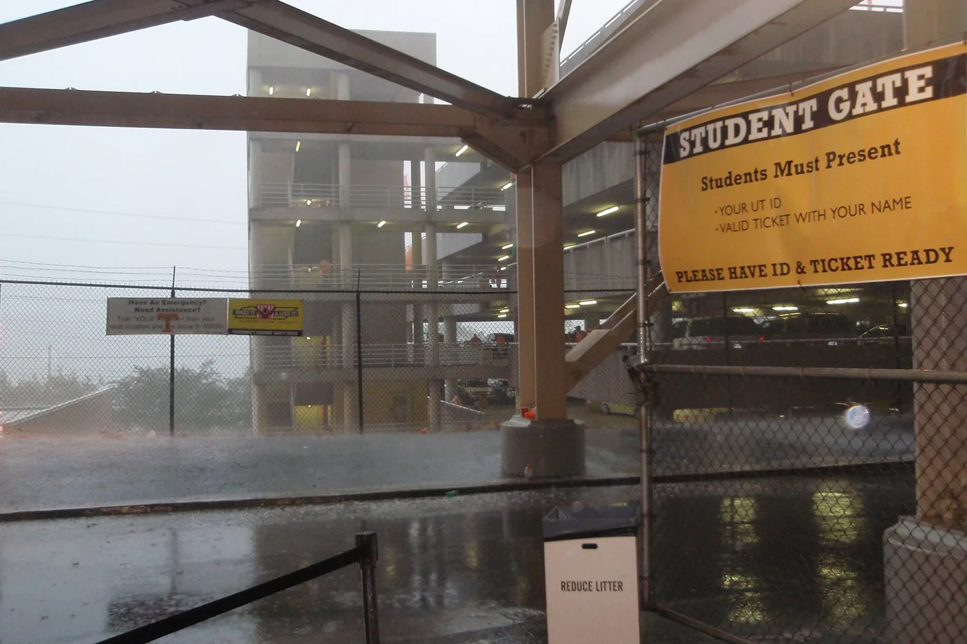 Thunderstorm downpour at a student gate of Neyland Stadium in Knoxville, Tennessee
