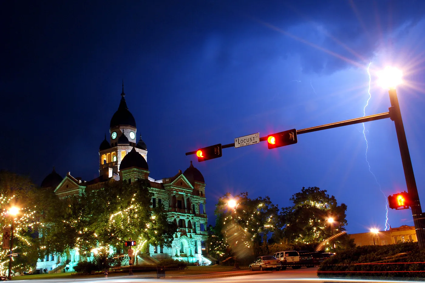 Lightning striking behind the courthouse square in Denton, Texas, during a summer thunderstorm