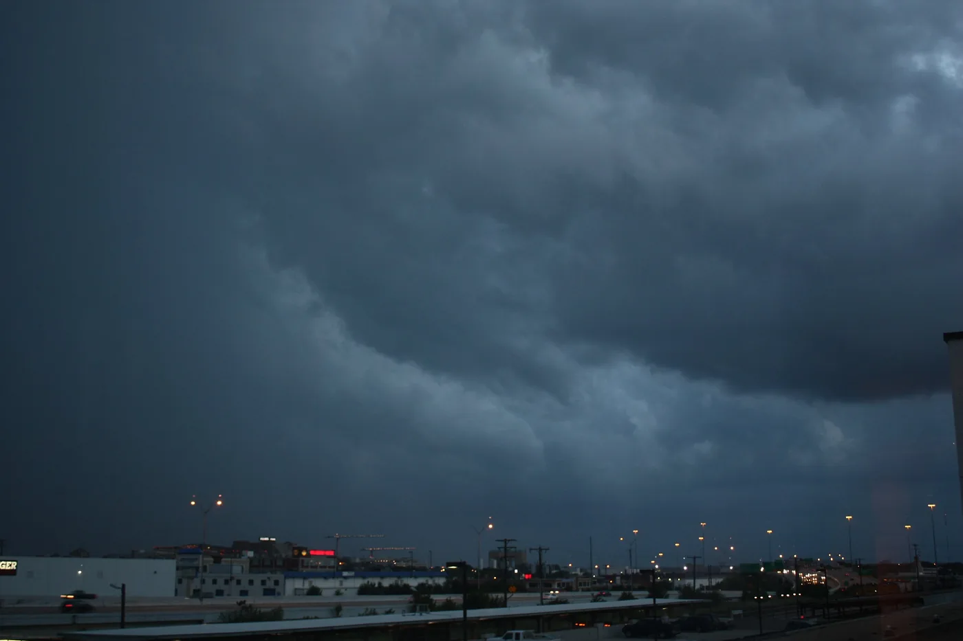 Dark storm clouds over Fort Worth, Texas, seen from an apartment window