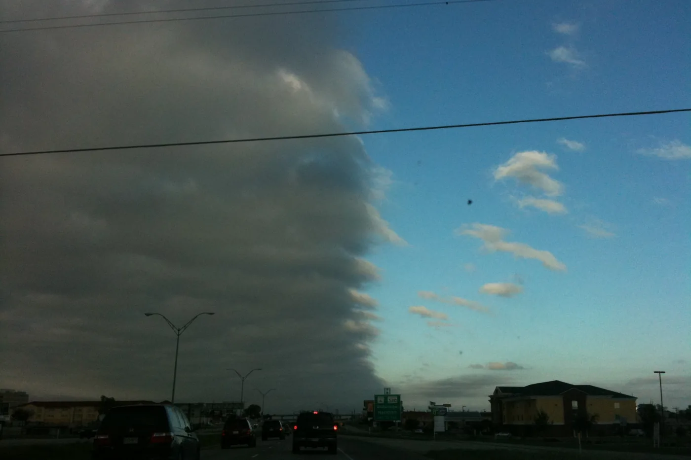 Dark wall of storm clouds moving in against a clear sky over Waco, Texas, in October 2009