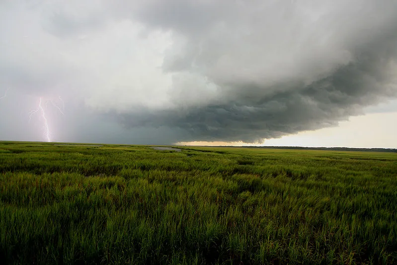 Shelf cloud and lightning over coastal marsh along the Brunswick River in Georgia